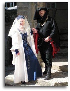 wealthy medieval noble and wife ready for medieval banquet